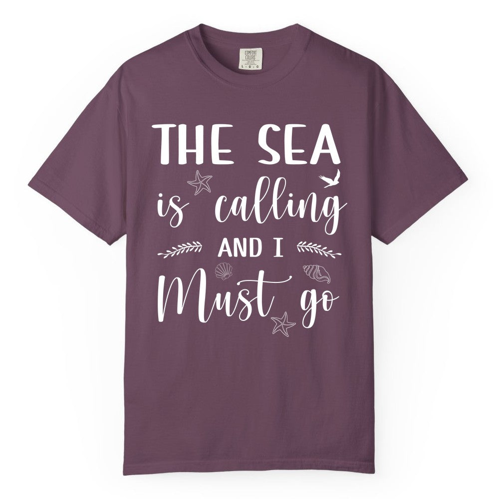 The Sea Is Calling Shirt - Ocean Lover Apparel Beach Vacation Tee (Comfort Color) in Berry - The Sea Is Calling Shirt - Ocean Typography With Shells and Starfish