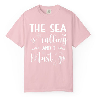 The Sea Is Calling Shirt - Ocean Lover Apparel Beach Vacation Tee (Comfort Color) in Blossom - The Sea Is Calling Shirt - Ocean Typography With Shells and Starfish