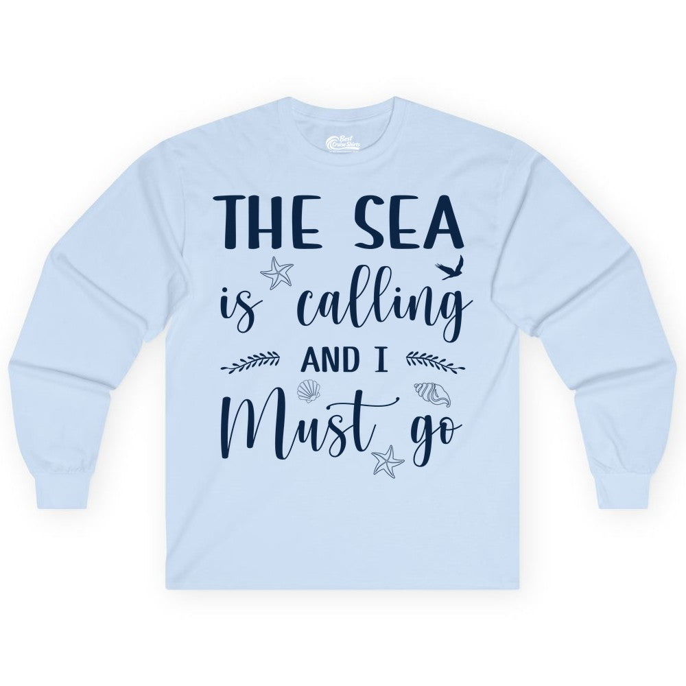 The Sea Is Calling Shirt - Ocean Lover Apparel Beach Vacation Tee (Long Sleeve) in Light Blue - The Sea Is Calling Shirt - Ocean Typography With Shells and Starfish
