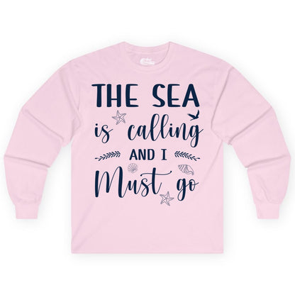 The Sea Is Calling Shirt - Ocean Lover Apparel Beach Vacation Tee (Long Sleeve) in Light Pink - The Sea Is Calling Shirt - Ocean Typography With Shells and Starfish