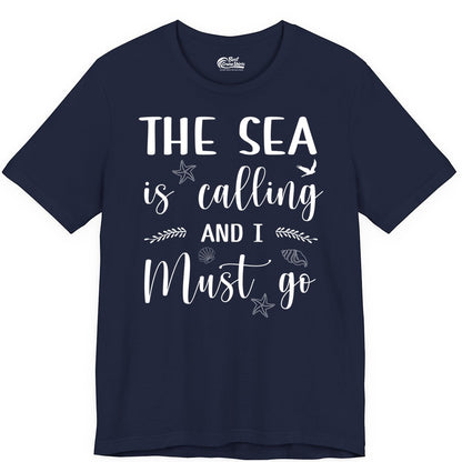 The Sea Is Calling Shirt - Ocean Lover Apparel Beach Vacation Tee (Premium Tee) in Navy - The Sea Is Calling Shirt - Ocean Typography With Shells and Starfish