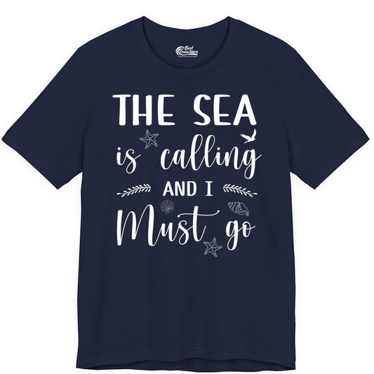 The Sea Is Calling Shirt - Ocean Lover Apparel Beach Vacation Tee (Premium Tee) in Navy - The Sea Is Calling Shirt - Ocean Typography With Shells and Starfish