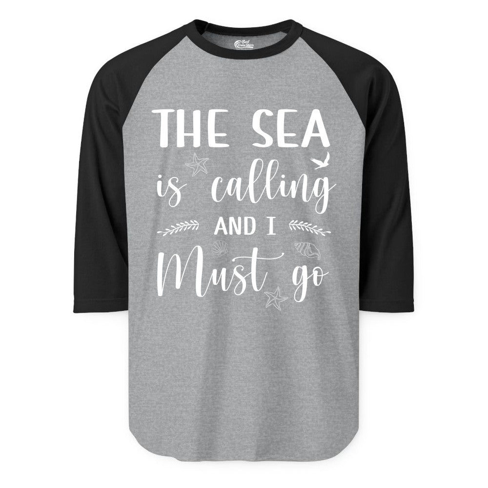 The Sea Is Calling Shirt - Ocean Lover Apparel Beach Vacation Tee (Raglan) in Heather GreyBlack - The Sea Is Calling Shirt - Ocean Typography With Shells and Starfish
