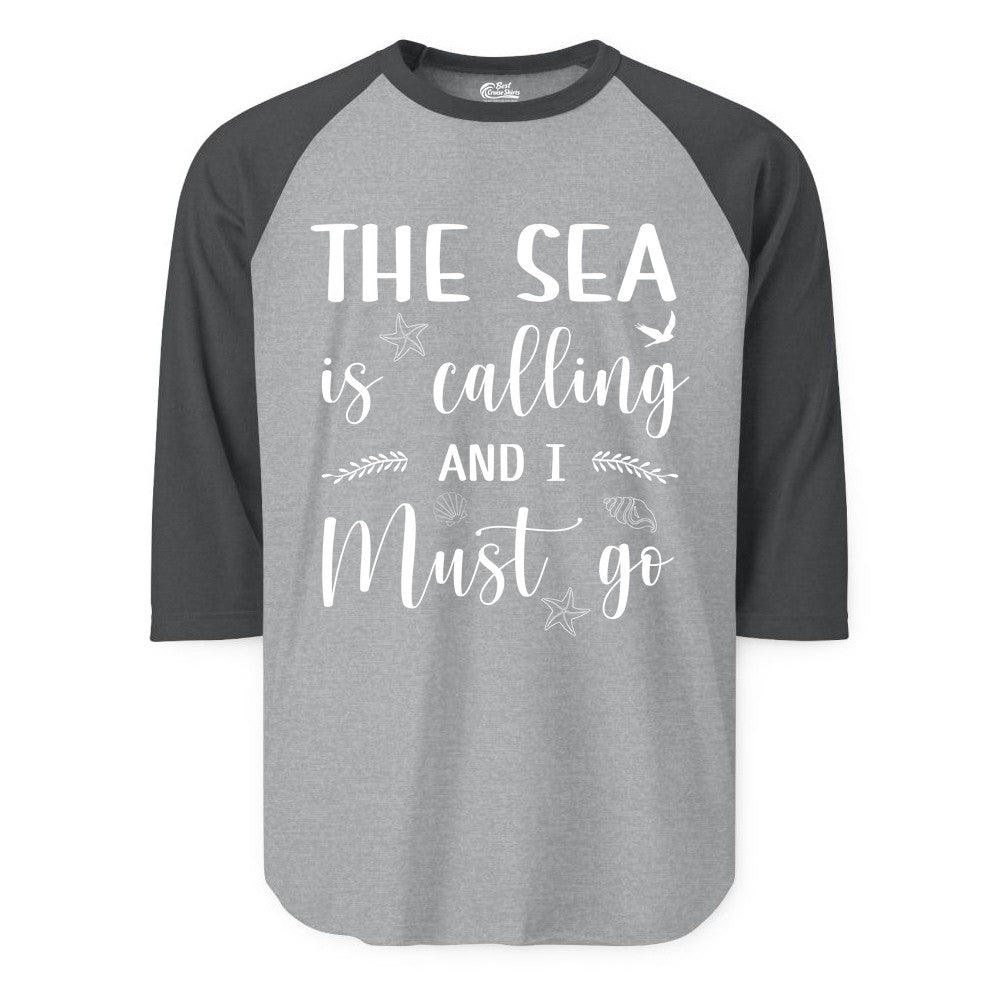 The Sea Is Calling Shirt - Ocean Lover Apparel Beach Vacation Tee (Raglan) in Heather GreyHeather Charcoal - The Sea Is Calling Shirt - Ocean Typography With Shells and Starfish