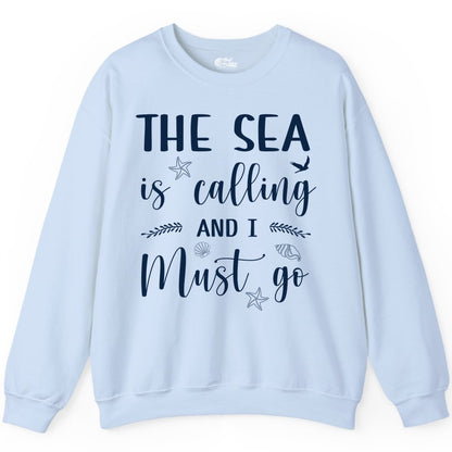 The Sea Is Calling Shirt - Ocean Lover Apparel Beach Vacation Tee (Sweatshirt) in Light Blue - The Sea Is Calling Shirt - Ocean Typography With Shells and Starfish