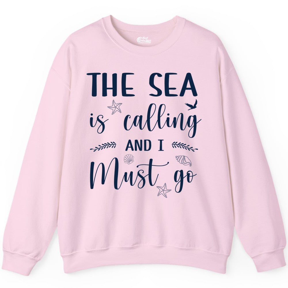 The Sea Is Calling Shirt - Ocean Lover Apparel Beach Vacation Tee (Sweatshirt) in Light Pink - The Sea Is Calling Shirt - Ocean Typography With Shells and Starfish
