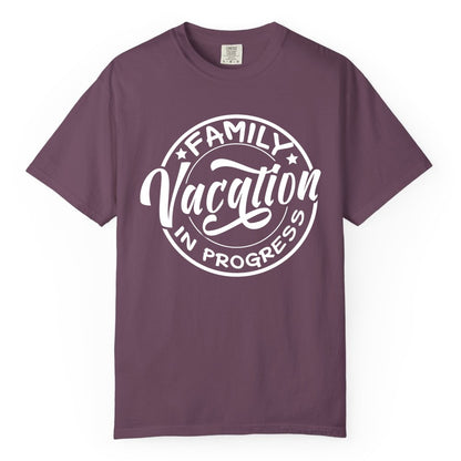 Family Vacation Shirt - Fun Family Travel Shirt for Holiday Trips (Comfort Color) in Berry - Family Vacation In Progress Bold Circular Stamp Travel Shirt