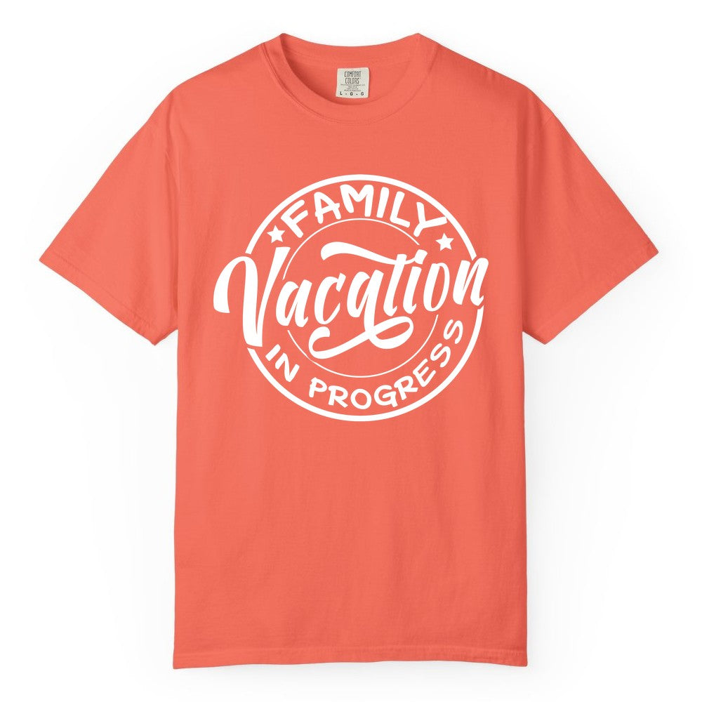 Family Vacation Shirt - Fun Family Travel Shirt for Holiday Trips (Comfort Color) in Bright Salmon - Family Vacation In Progress Bold Circular Stamp Travel Shirt