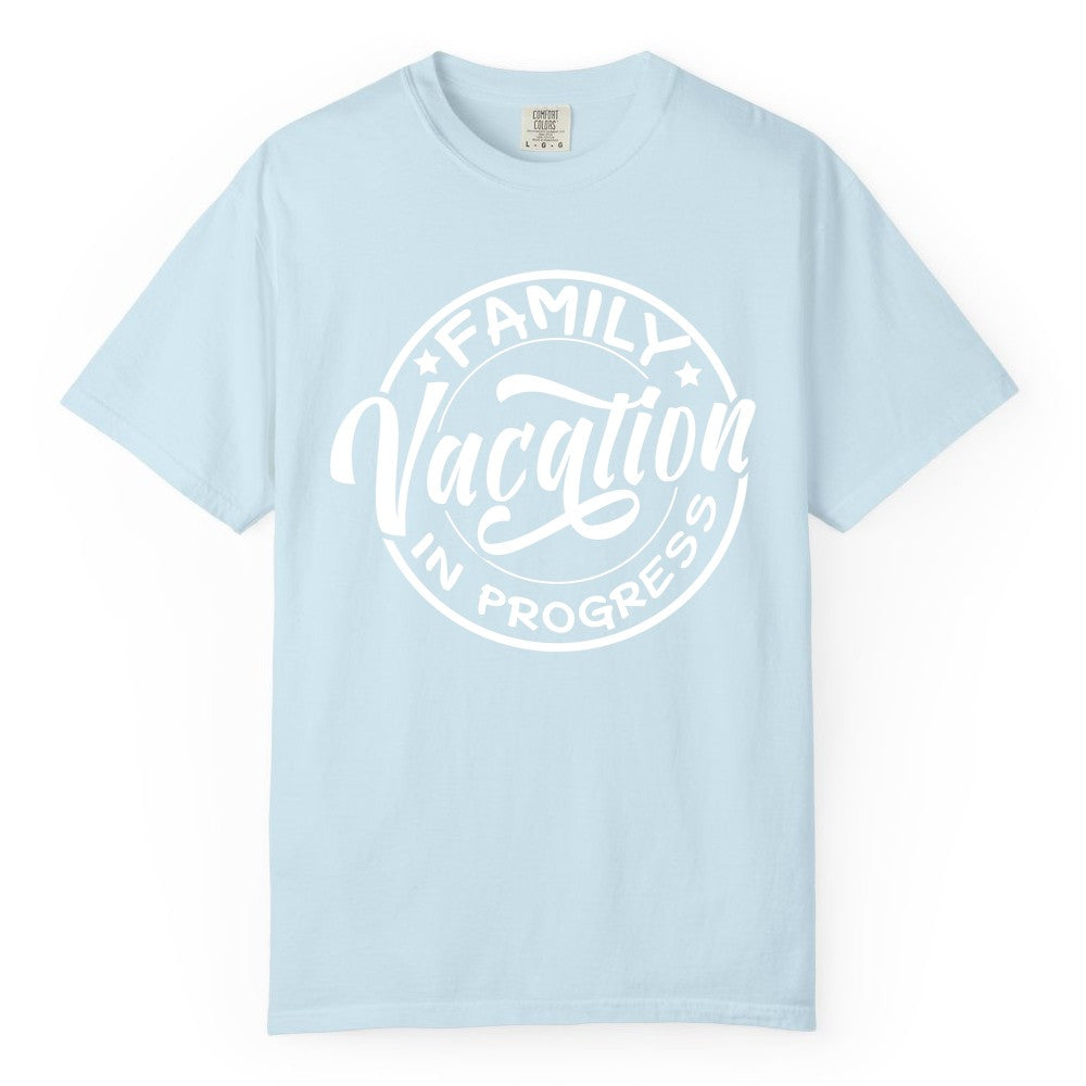 Family Vacation Shirt - Fun Family Travel Shirt for Holiday Trips (Comfort Color) in Chambray - Family Vacation In Progress Bold Circular Stamp Travel Shirt