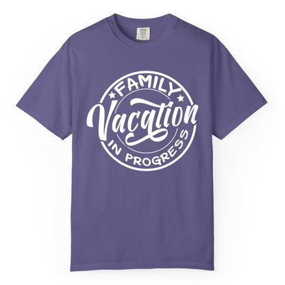 Family Vacation Shirt - Fun Family Travel Shirt for Holiday Trips (Comfort Color) in Grape - Family Vacation In Progress Bold Circular Stamp Travel Shirt