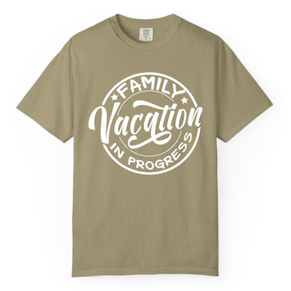 Family Vacation Shirt - Fun Family Travel Shirt for Holiday Trips (Comfort Color) in Khaki - Family Vacation In Progress Bold Circular Stamp Travel Shirt